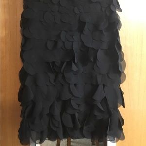 Paniz Size 6 Black skirt Playful texture, fully lined.